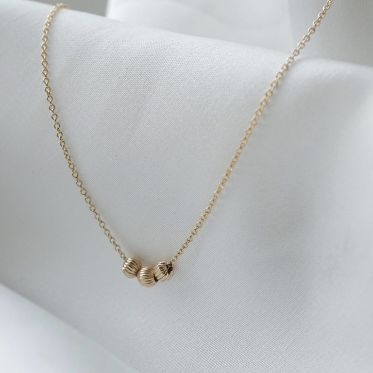 TRIPLE ORBIT NECKLACE