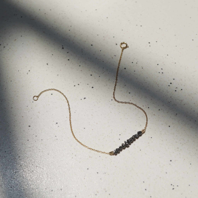 A BLACK RAW DIAMOND BRACELET