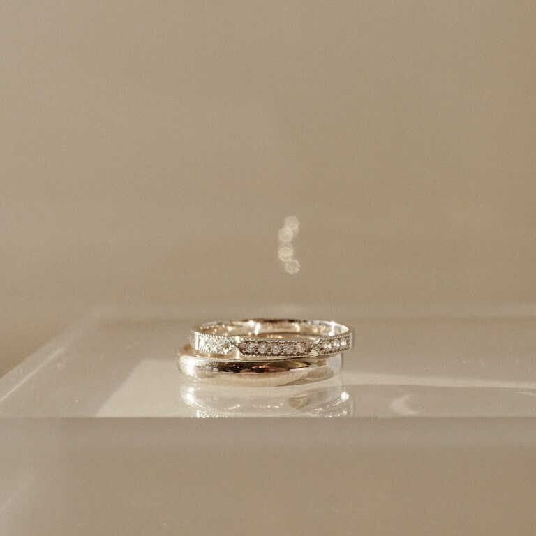 FRENCH PAVE RING AND D-SHAPE BAND RING