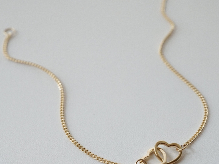 DOUBLE HEART CURB BRACELET