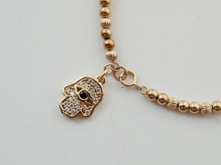 BEADED ORBIT BRACELET – HAMSA HAND