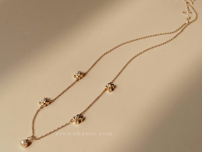 MULTI RIBBON PEARL NECKLACE