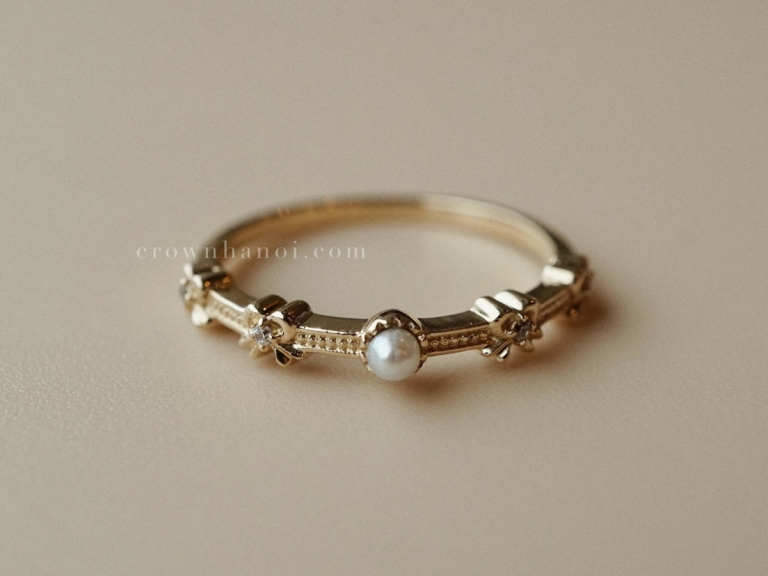 MULTI RIBBON PEARL RING