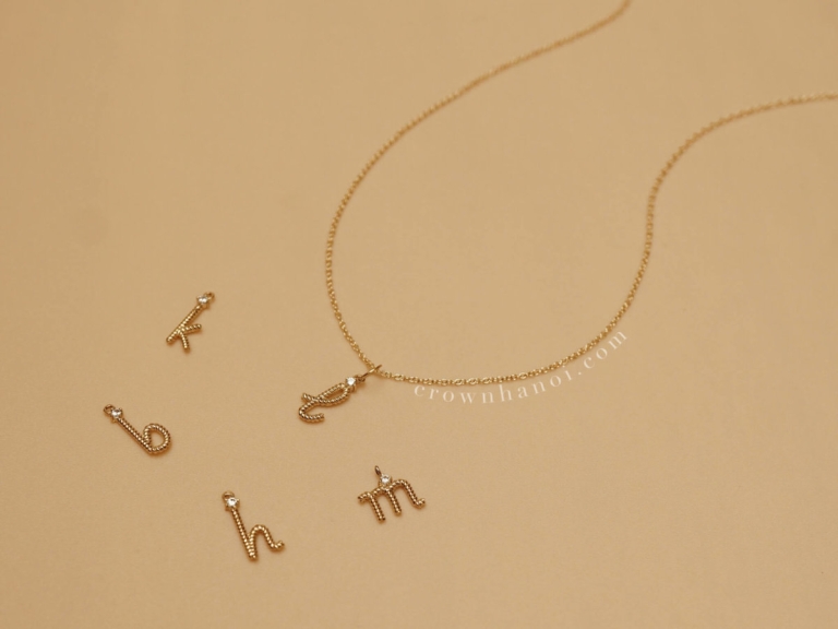 TWIST LOWERCASE LETTER NECKLACE