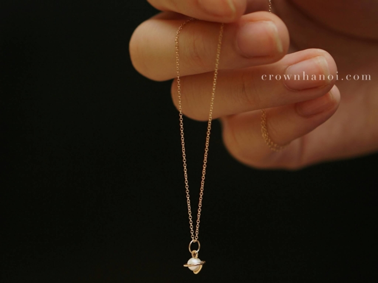 PEARL PLANET NECKLACE