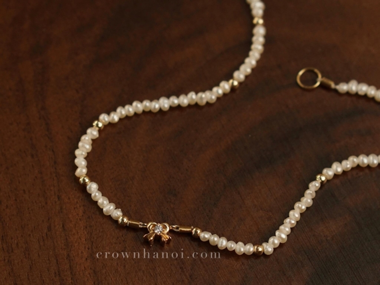 RIBBON BABY PEARL BRACELET