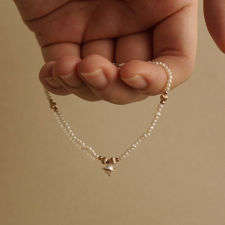 PLANET - ORBIT BABY PEARL BRACELET