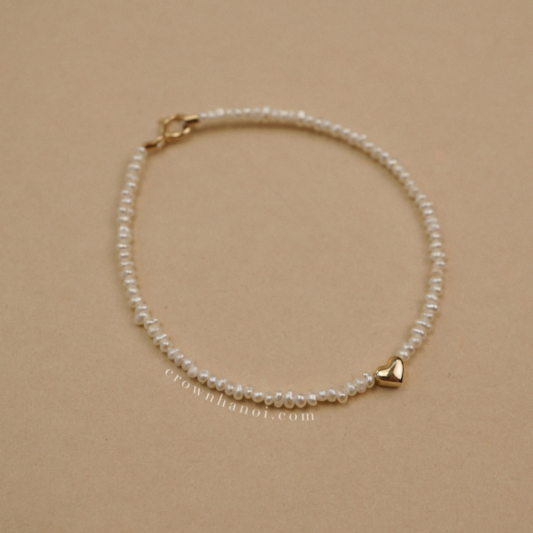 REVOLVING HEART - BABY PEARL BRACELET