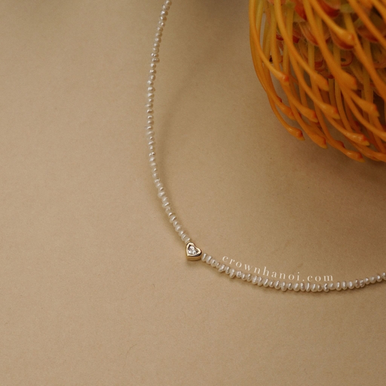 REVOLVING HEART - BABY PEARL NECKLACE