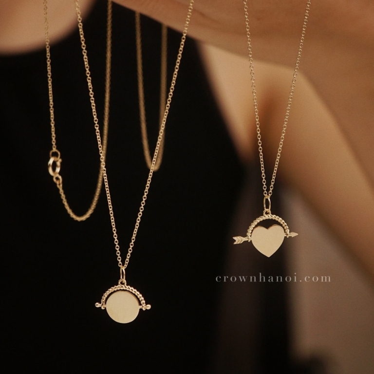 DISC SPINNER NECKLACE