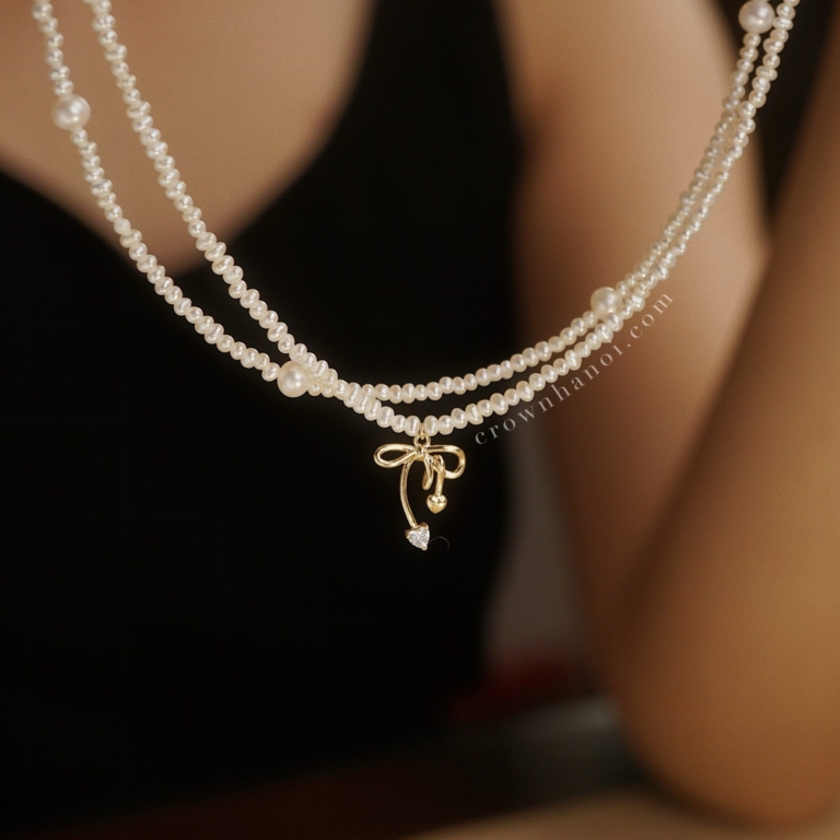 RIBBON KNOT - BABY PEARL NECKLACE